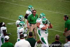 Coach Mac encourages the defense after 1st series